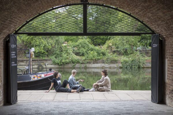 students by the canal