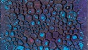 Blue layered paste on wood