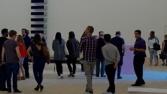 People in a gallery space