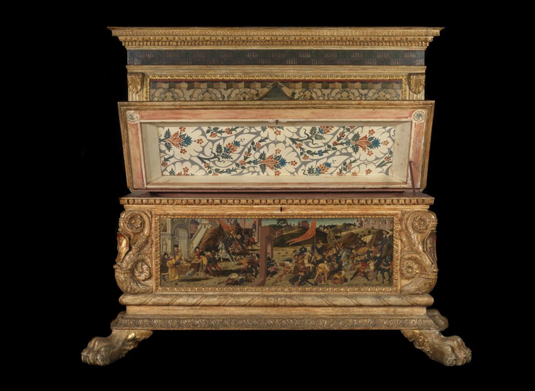 The Morelli-Nerli cassoni wedding chest includes intricate details such as coats of arms on the corners of each chest.