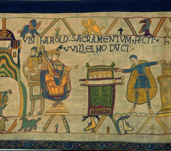 Detail of the Bayeux Tapestry ‘Scene 4: William sits on his throne watching as Harold, each hand on a reliquary, swears an oath’. Replica produced in 1895 to mirror the original from c.1070s. © Reading Museum (Reading Borough Council) Reading, United Kingdom.