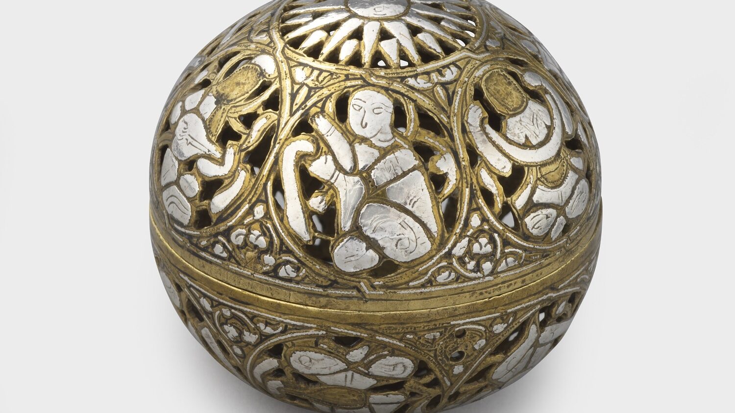 Incense burner of pierced and engraved brass inlaid with silver, with images of the planets within roundels, Mamluk, Syria, 13th century