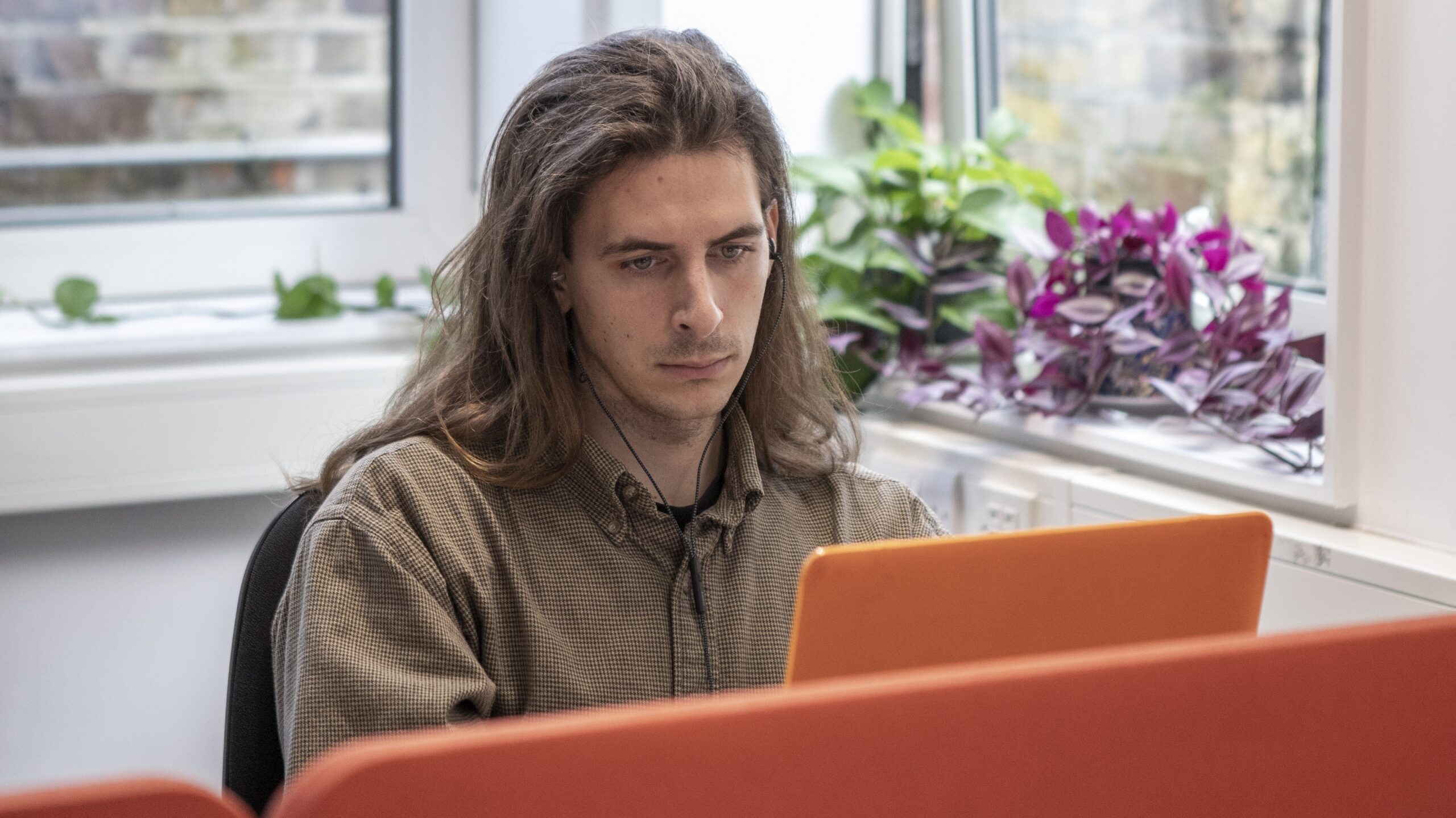 student looking at laptop