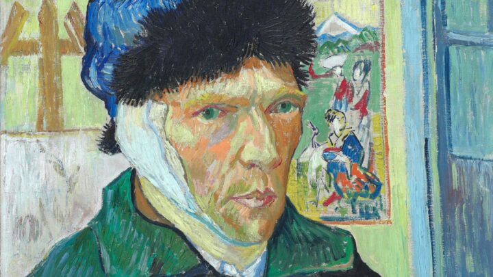 A self-portrait of Van Gogh wearing a green coat, a blue hat with a black trim, and a bandaged left ear. A Japanese print and an easel can be seen behind him.