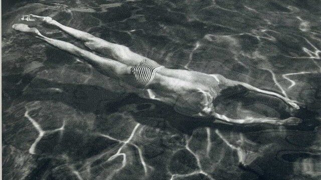 Photograph of someone swimming
