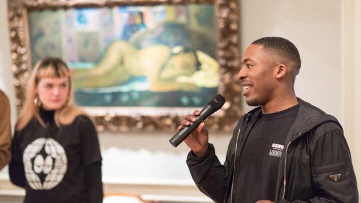 A speaker during one of out resfest events in 2017, speaking to an audience in the gallery