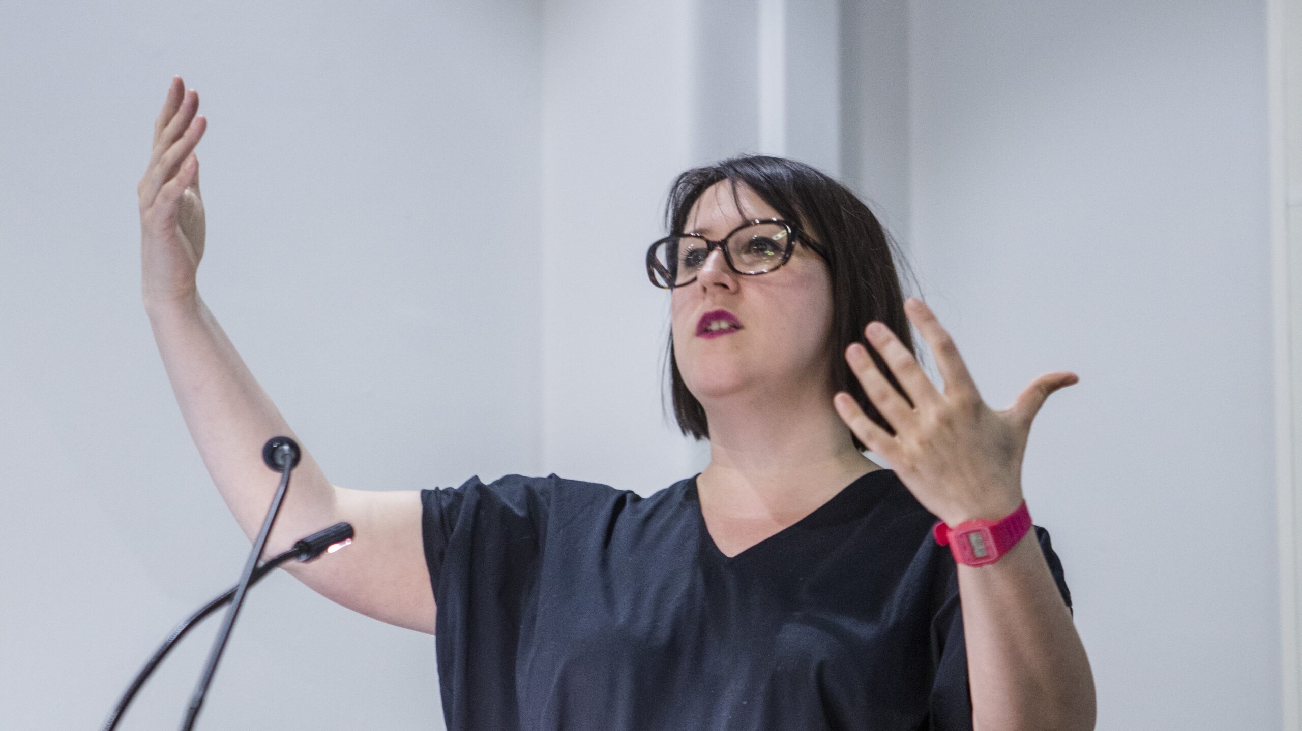 Woman delivering a lecture