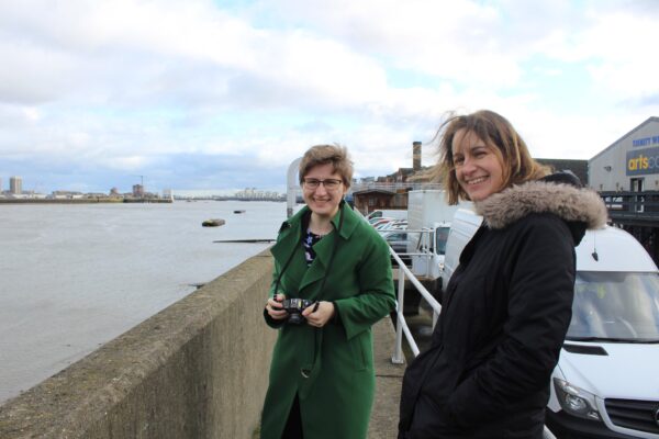 two students taking part in an outdoor photography workshop