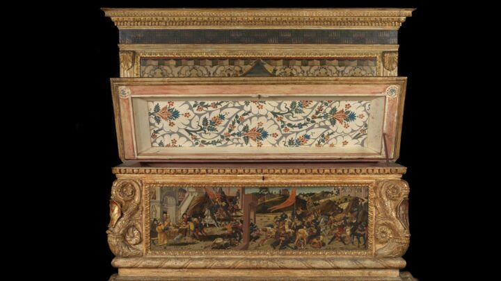 The Morelli-Nerli cassoni wedding chest includes intricate details such as coats of arms on the corners of each chest.  