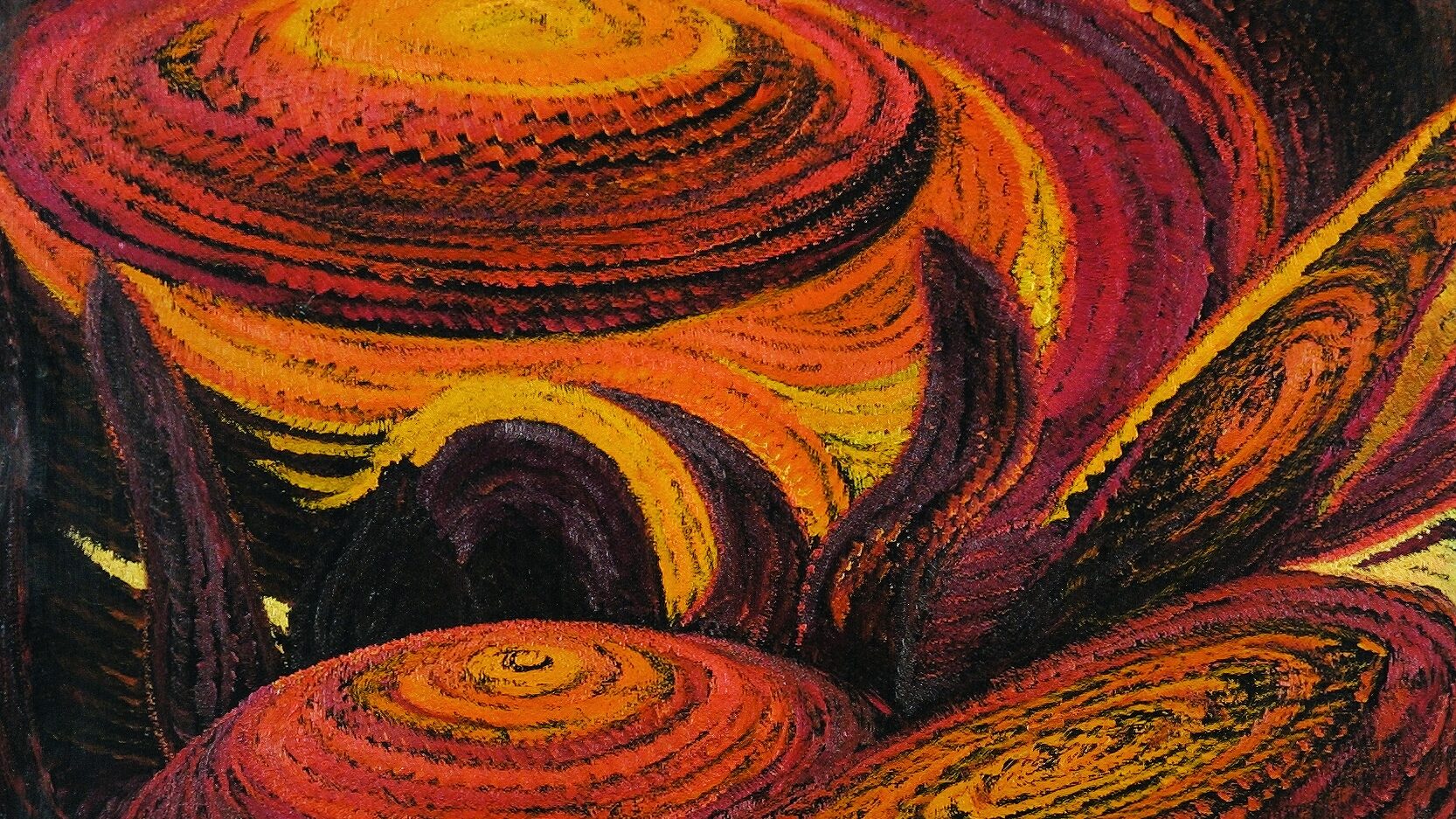 orange and yellow swirls make up spherical shapes, reminiscent of planets or the sun