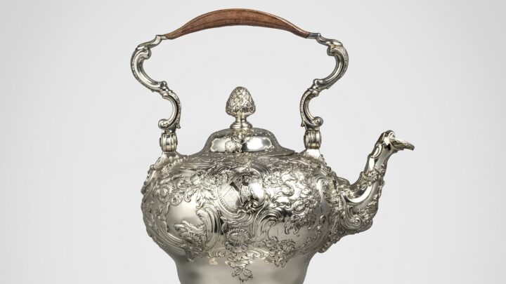 Ornate George II silver tea kettle with an ornate stand and handle
