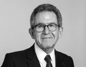 A black and white portrait of Lord Browne of Madingley, Chairman of The Courtauld