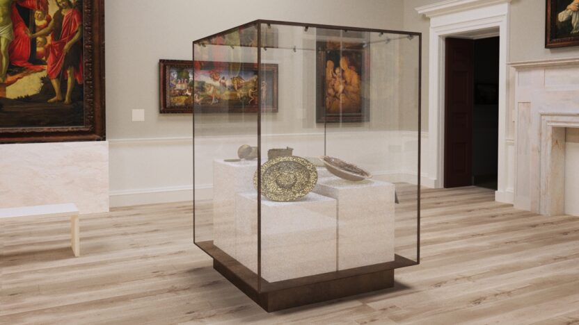 An image of the new Blavatnik Fine rooms, showing a display case including decorative arts and paintings on the rear wall such as the Botticelli Altarpiece