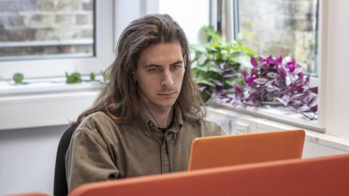 student looking at laptop