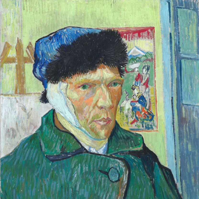 A self-portrait of Van Gogh wearing a green coat, a blue hat with a black trim, and a bandaged left ear. A Japanese print and an easel can be seen behind him.