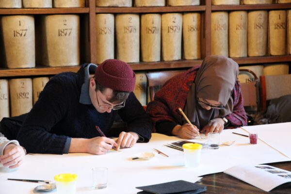 students trying out pigments at Lambeth Palace Library