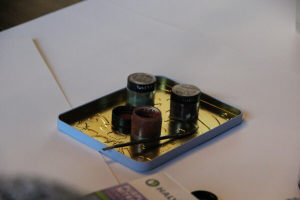 mixed pigments in glass jars