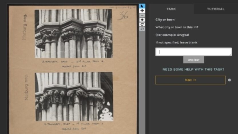 Black and white images of architecture from the Conway Library are shown on a brown mount, on a computer screen