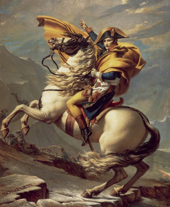 A french general on horseback in a rocky and stormy mountainside. His name is inscribed on a rock below.