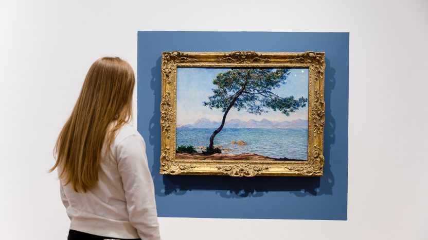 A woman looks at Antibes by Claude Monet whilst it is on display at the Ferens Art Gallery, Hull