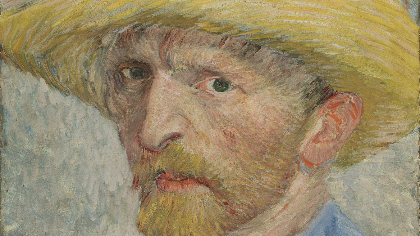 A self portrait of Van Gogh; he is wearing a yellow straw hat, a blue shirt and gazing at the viewer with a serious expression