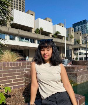 A student outside a building