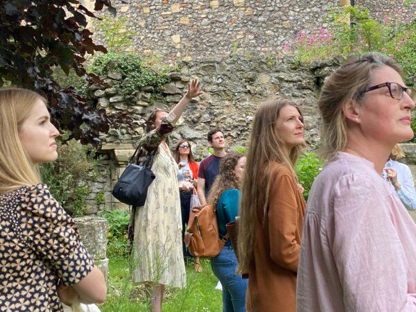 Dr Emily Guerry gives a tour of Canterbury cathedral Garden to Material Witness students