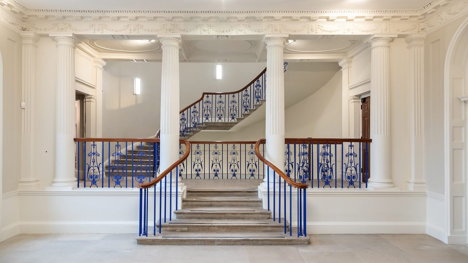 Interior shot of stairway and columns