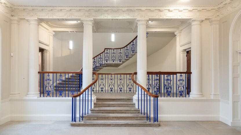 Interior shot of stairway and columns