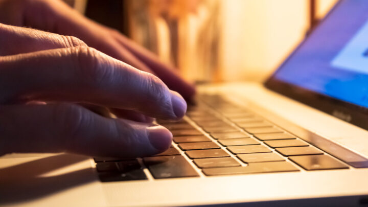 typing on a laptop