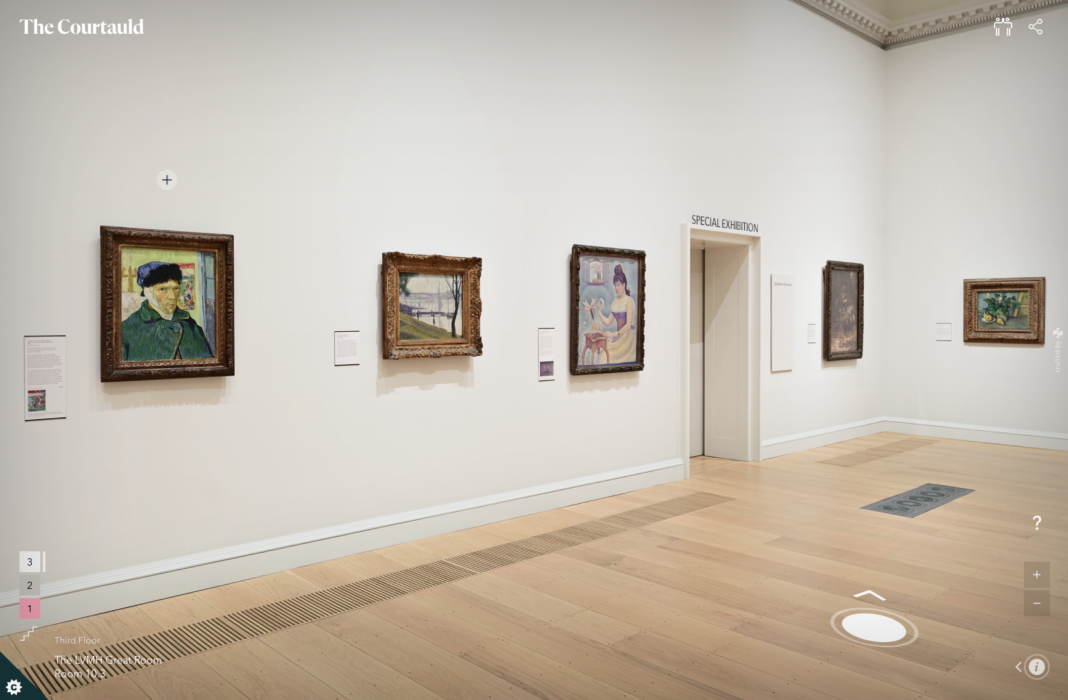 Gallery with paintings on a white wall.