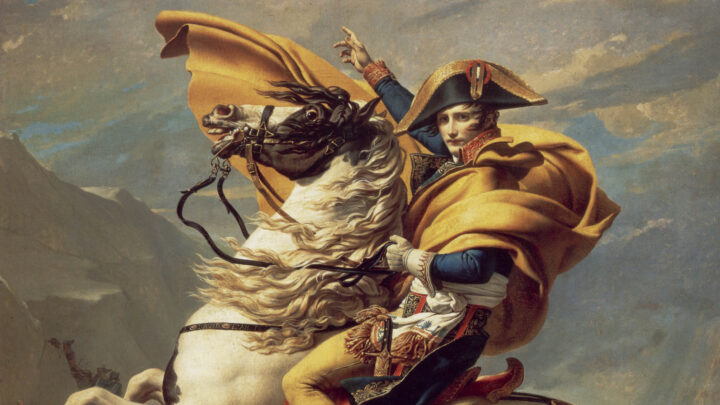 A french general on horseback in a rocky and stormy mountainside. His name is inscribed on a rock below.