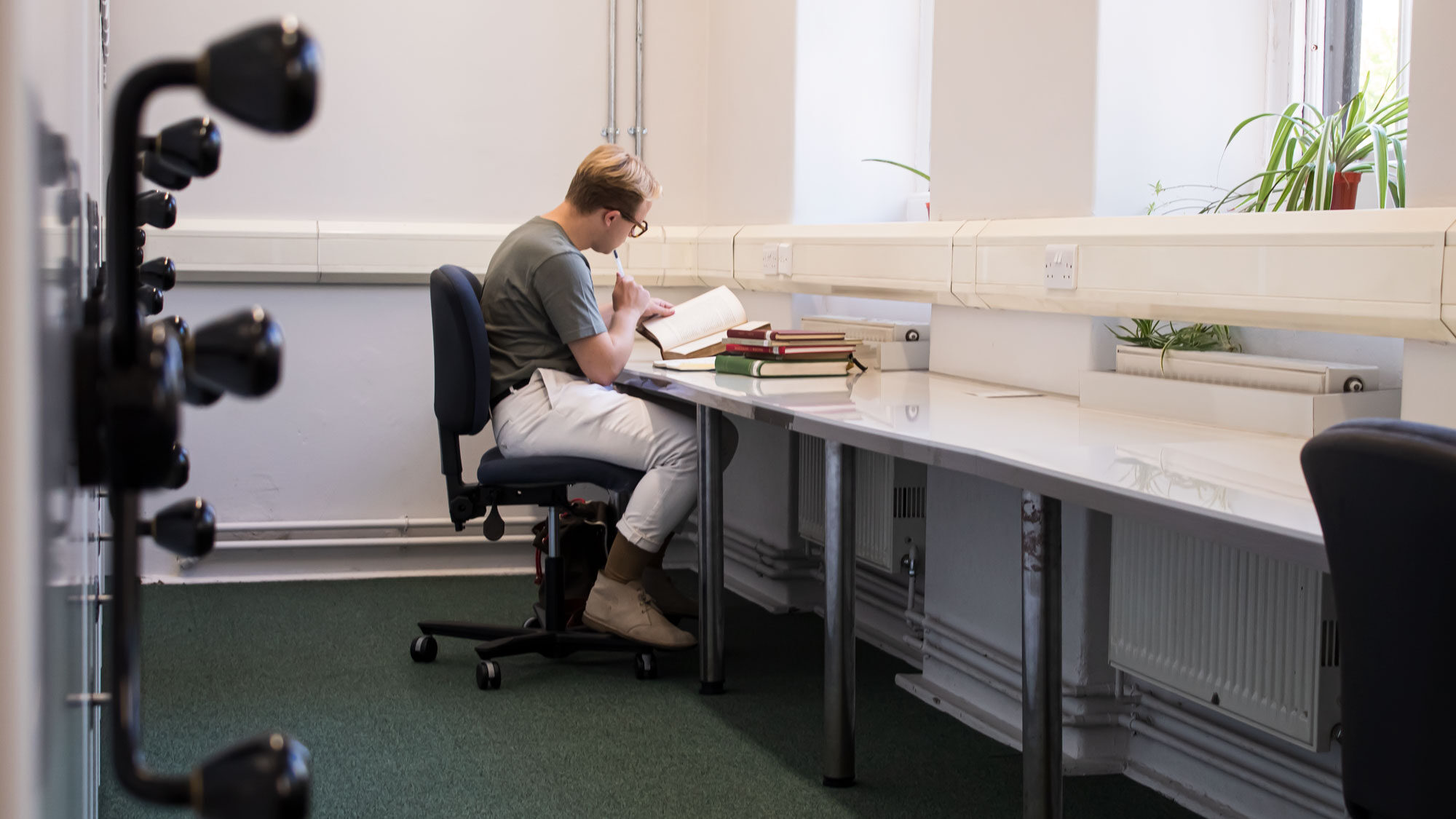 Student reading in the library