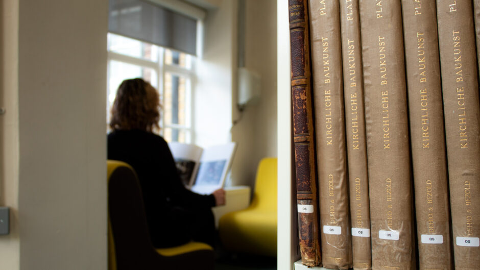 Student reading in the library
