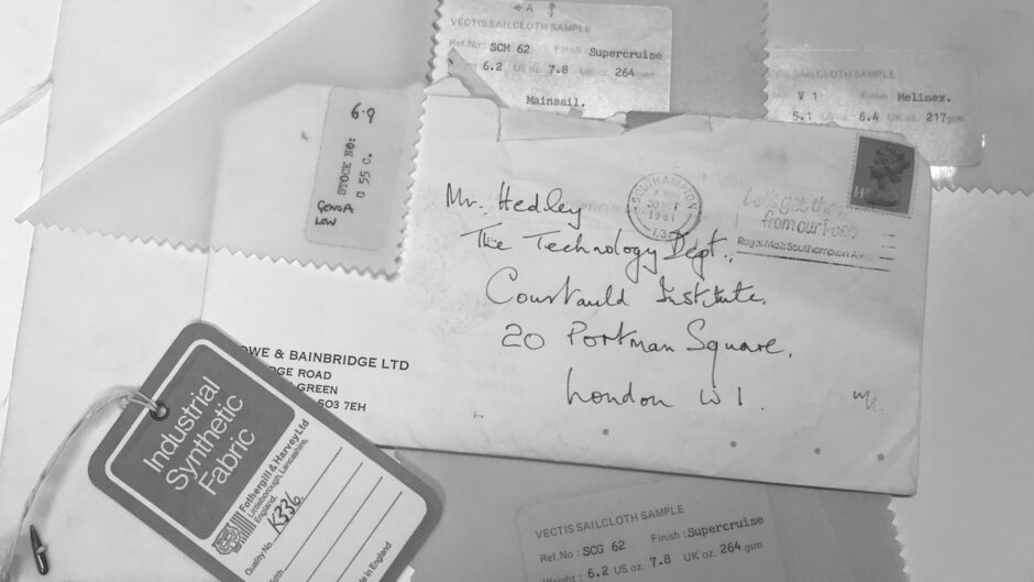 A collection of handwritten letters, tags and samples in black and white