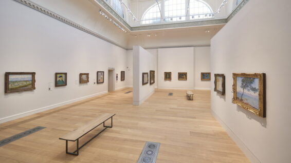image of the Courtauld's great room showing paintings of Cezanne on the wall
