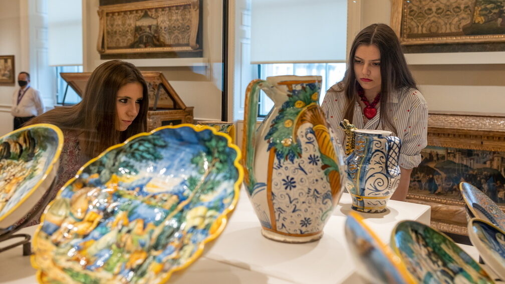 People looking at an object