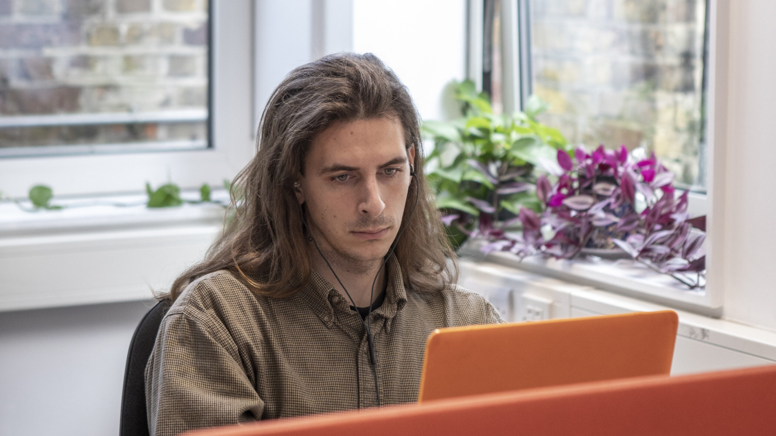 student looking at laptop