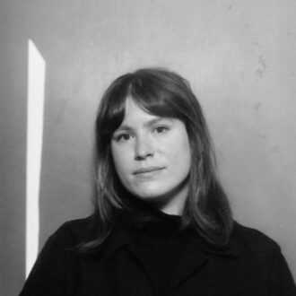 Black and white picture of a woman with a black jumper