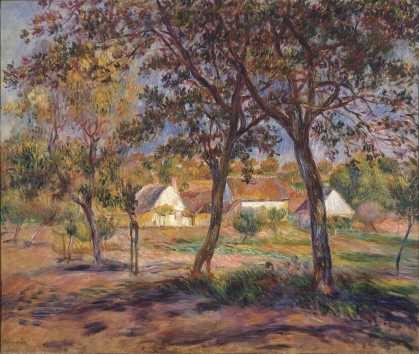 A group of houses can be seen behind the trees in a colourful forest.