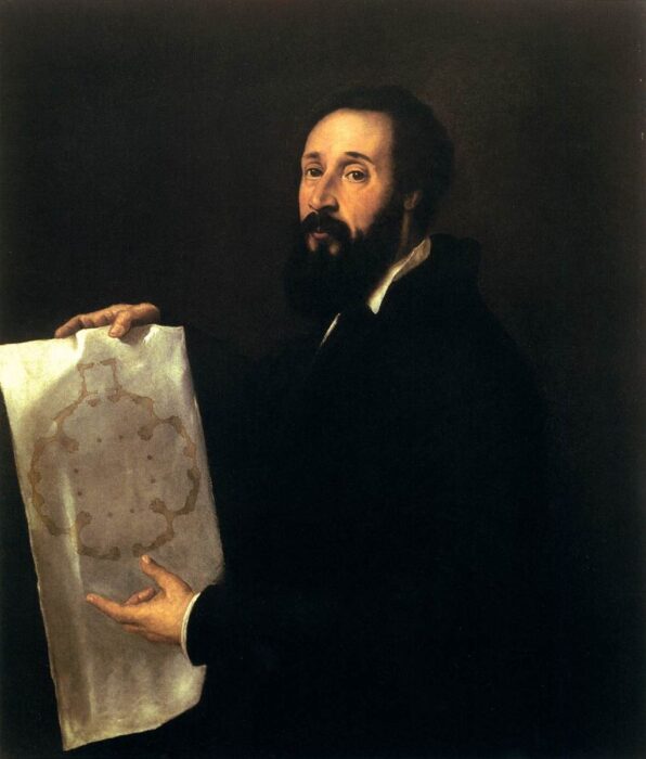 Giulio Romano holds and gestures towards an architectural plan.