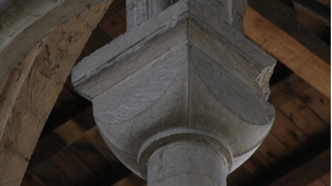 Photograph of the top of a stone pillar