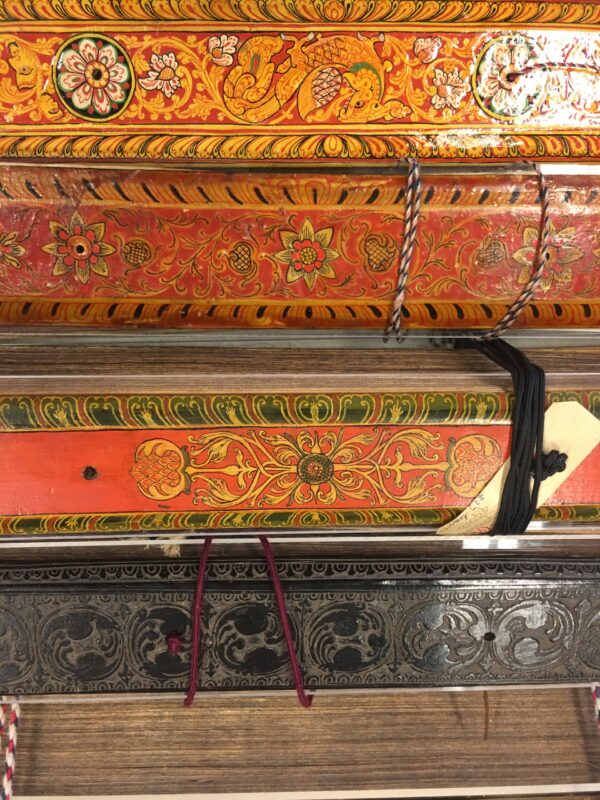 Photograph showing the colourful decorated spines of a series of books