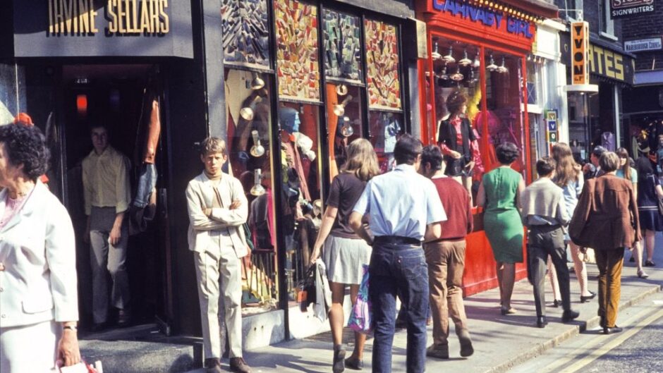 People walking along the shops on Carnaby Street.
