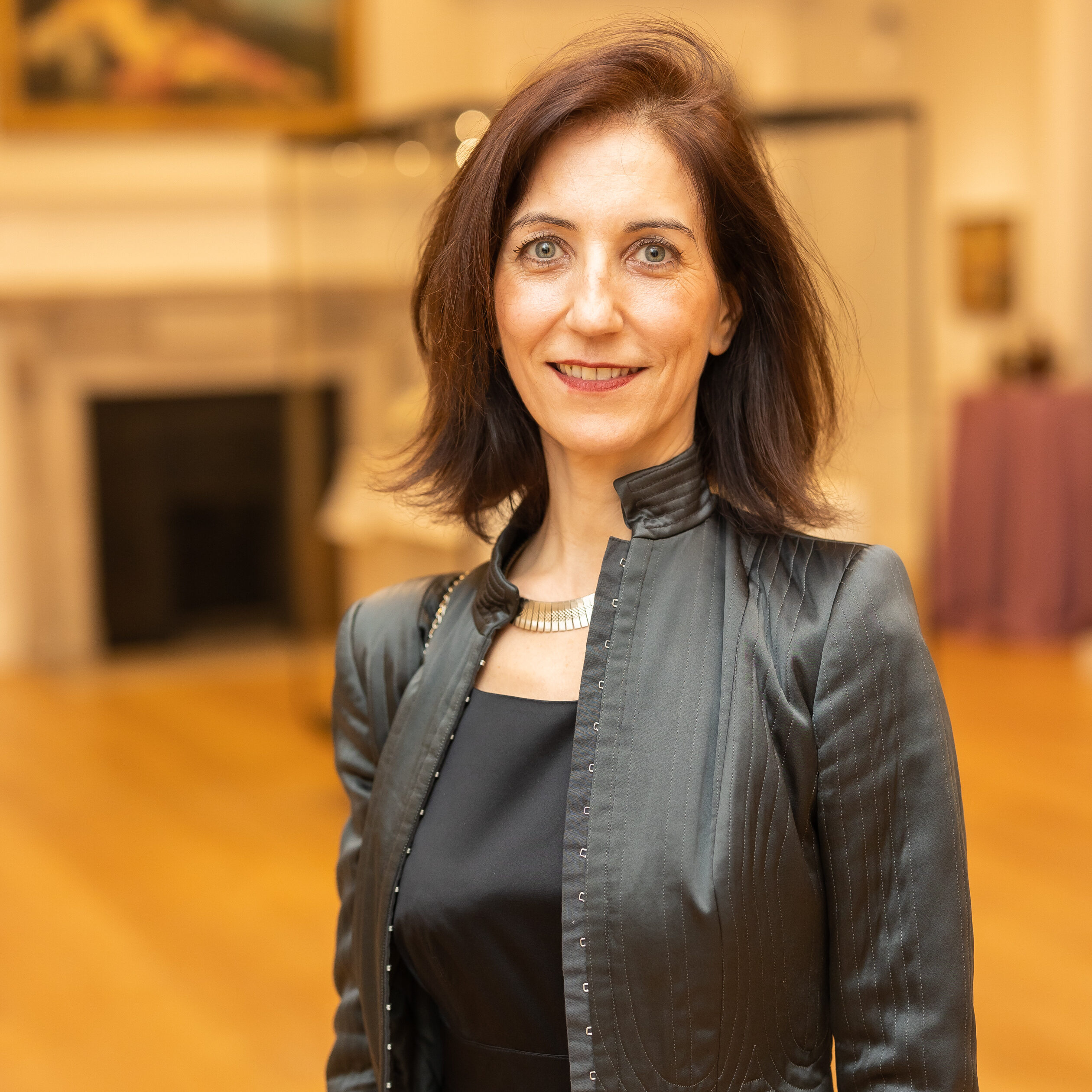 potrait picture of Dr Ketty Gottardo, Martin Halusa Curator of Drawings, in one of the Courtauld's gallery rooms