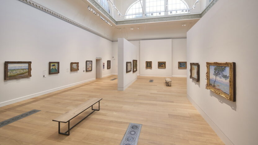 image of the Courtauld's great room showing paintings of Cezanne on the wall