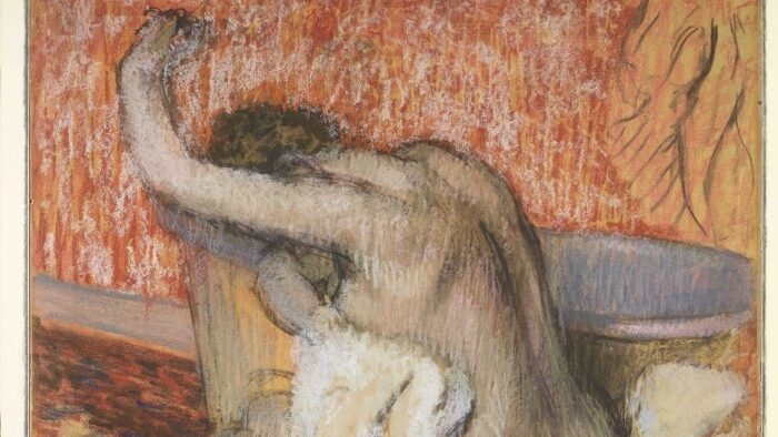 A drawing of a nude woman sitting on a red sofa atop a beige cushion, drying herself with a white towel. Her left arm is raised and her face obscured from the viewer. The background is fully red, and the sketch is an unblended charcoal, creating unusual graphic rhythms.