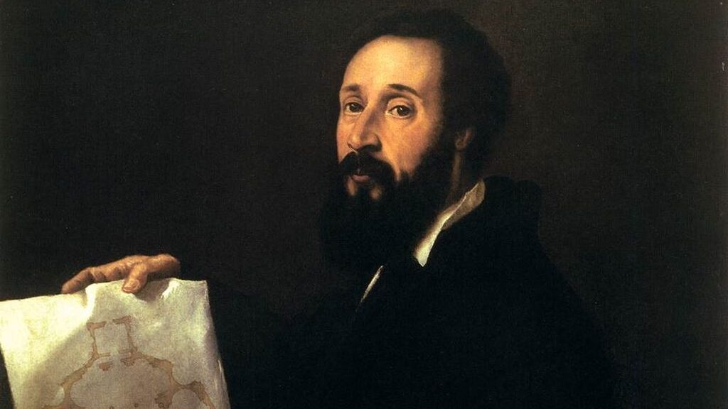 Giulio Romano holds and gestures towards an architectural plan.