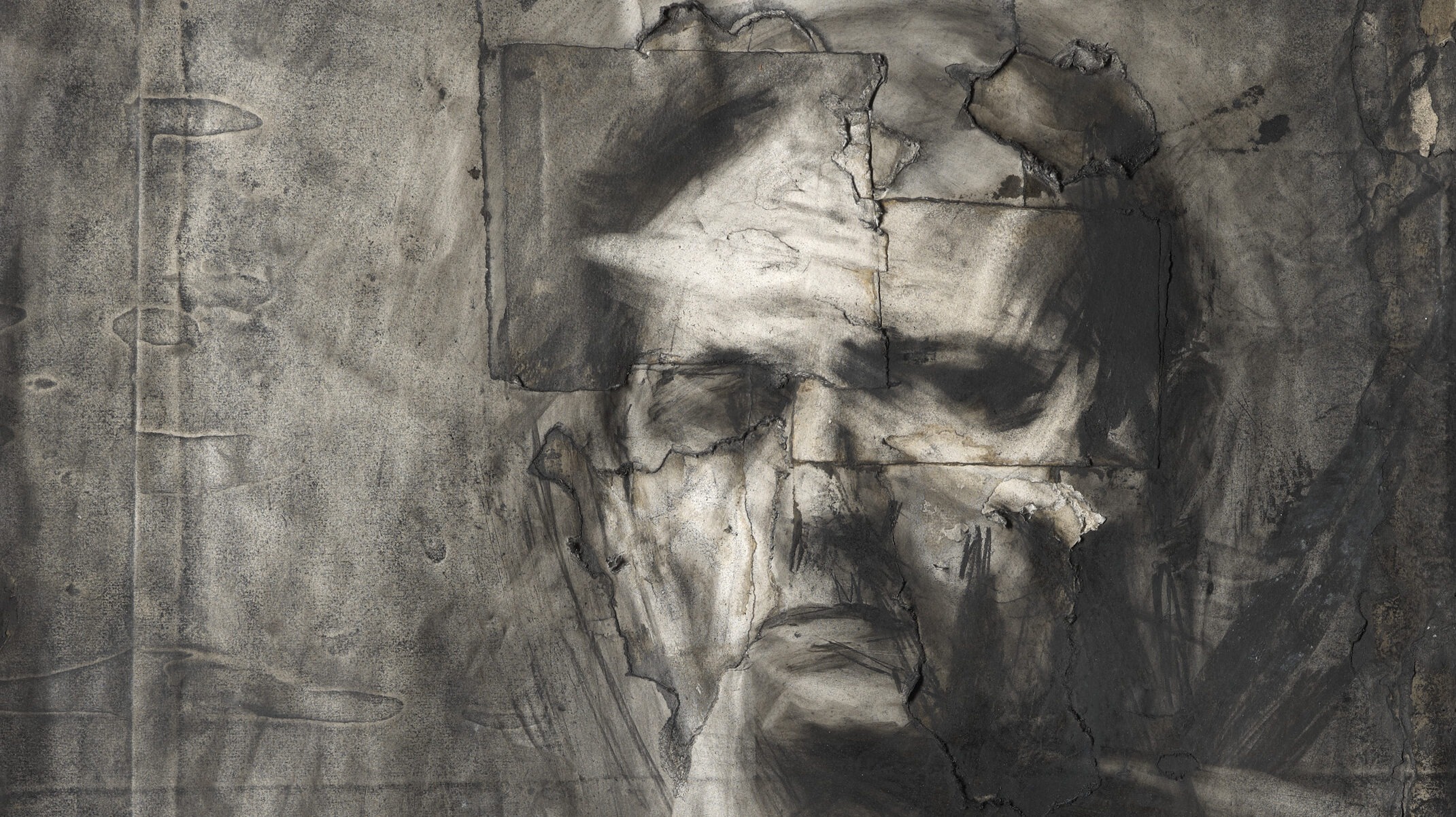 A portrait in charcoal and chalk of a man