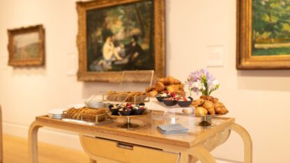 a table with a food buffet in the Courtauld Gallery